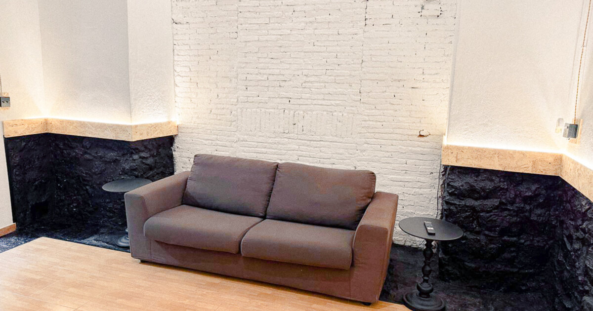 The living area of Lavika Loft with an equipped kitchen