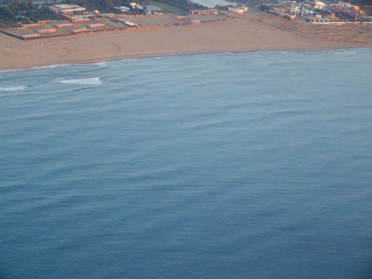 The long sandy beach of La Plaia in Catania